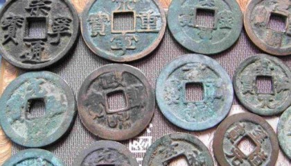 西夏货币使用情况：大量使用北宋钱币，本国钱币只作象征