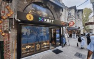 特朗普关税风暴升级至50% 币安网合约交易平台承压 XBIT或成避险新宠？